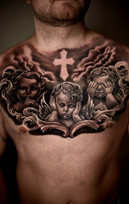 Black and grey chest piece of cherubs and a cross among storm clouds