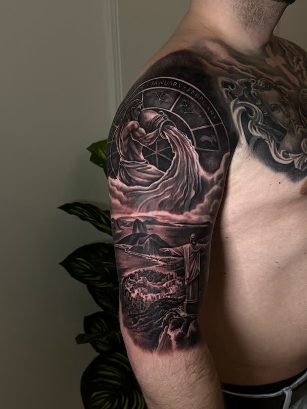 Aquarius zodiac full sleeve with water bearer, Christ the Redeemer and Rio landscape
