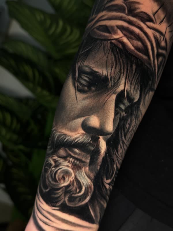 Close-up forearm portrait of Christ wearing the crown of thorns